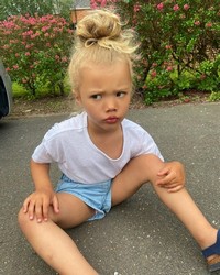 small girl in shorts