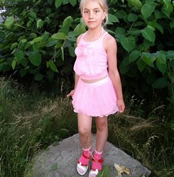 small girl in shorts